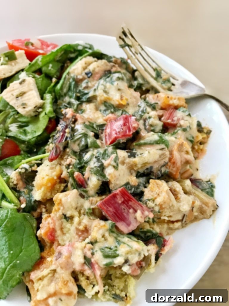 creamy dairy-free swiss chard and butternut squash gratin served with a fresh spring salad