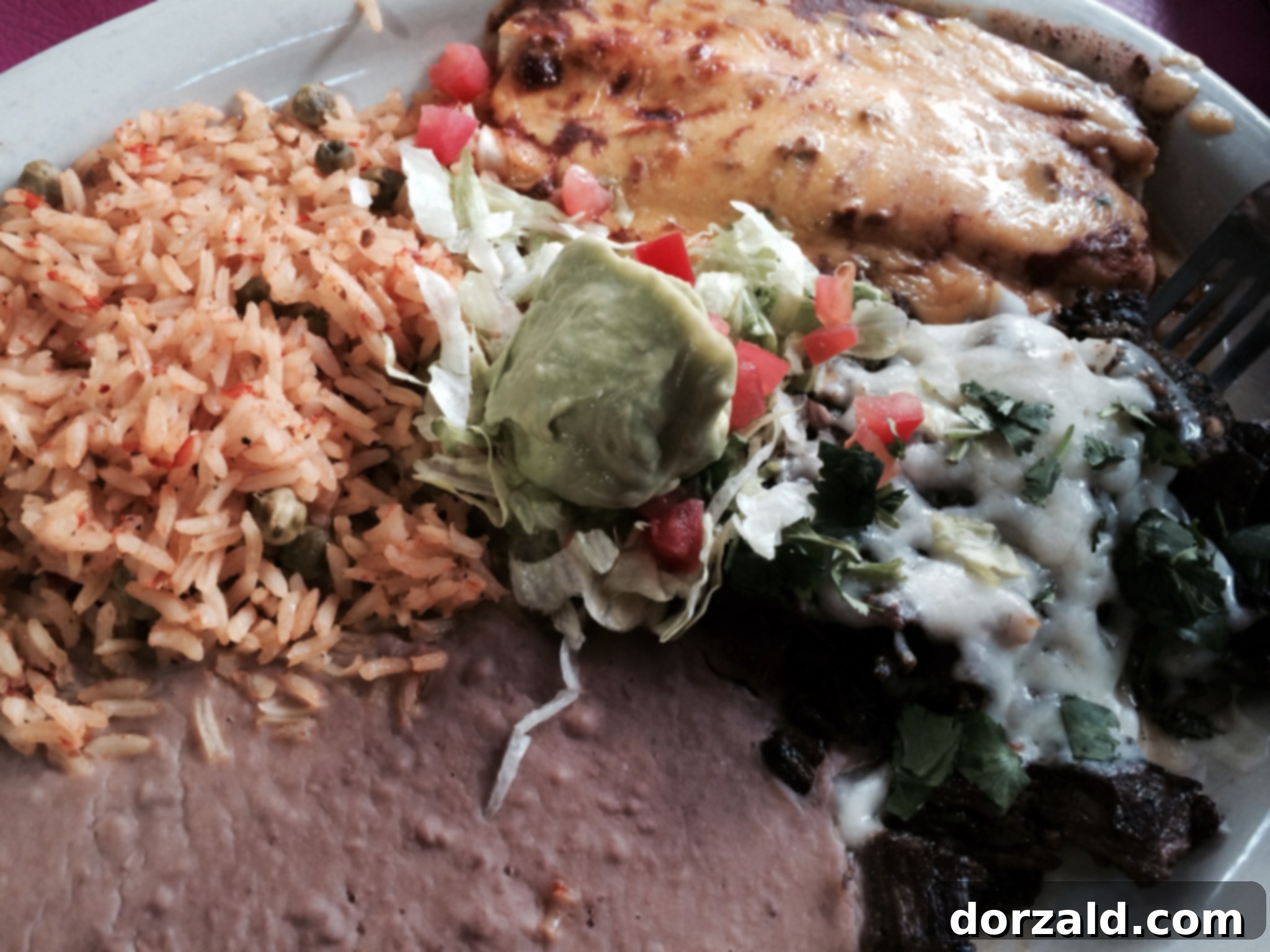 Sizzling Veggie Skillet with shrimp, bell peppers, and onions served at Adobe Verde