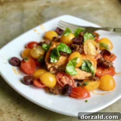 Delicious Jamie Oliver-Inspired Tomato Chorizo Salmon served on a plate