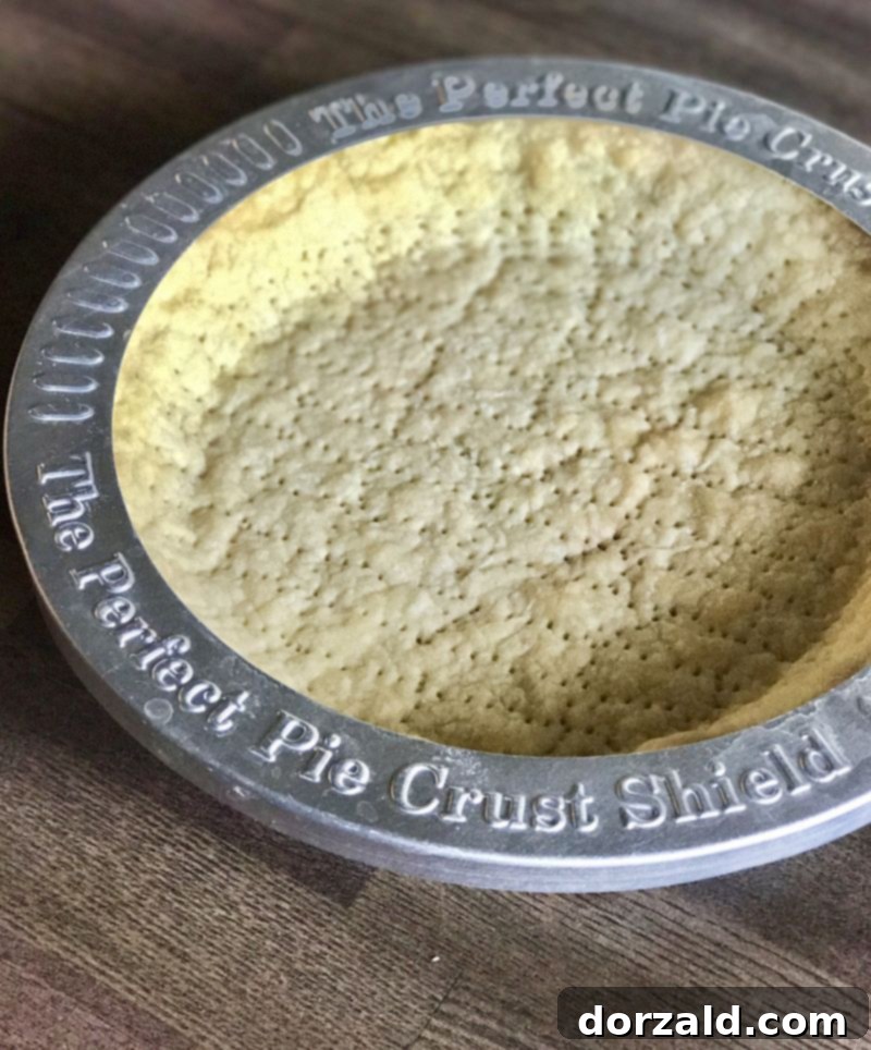 Flaky Dairy-Free Pie Crust 4 Pre-baked pie crust showing fork pricks to prevent bubbling