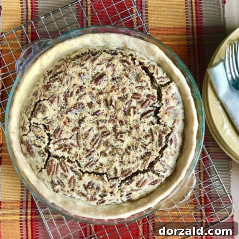 Zesty Dairy-Free Lemon Pecan Pie 2 Dairy-Free Lemon Pecan Pie, perfectly sliced on a holiday table.