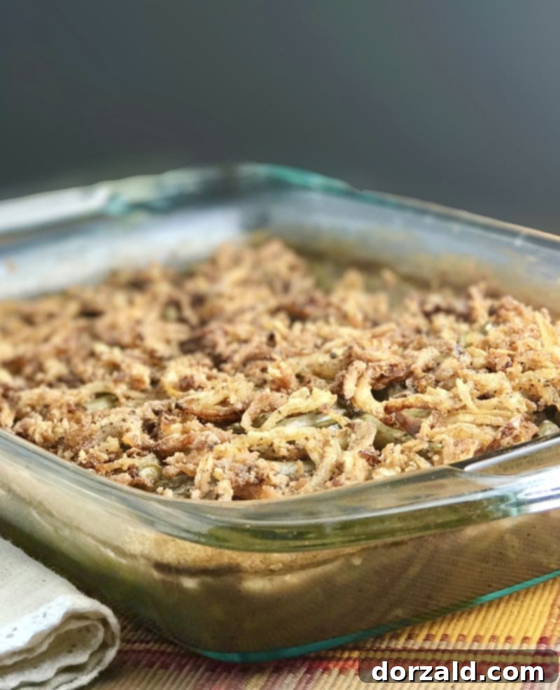 A close-up of the delectable Dairy-Free Gluten-Free Classic Green Bean Casserole ready to be served at an allergy-friendly holiday table