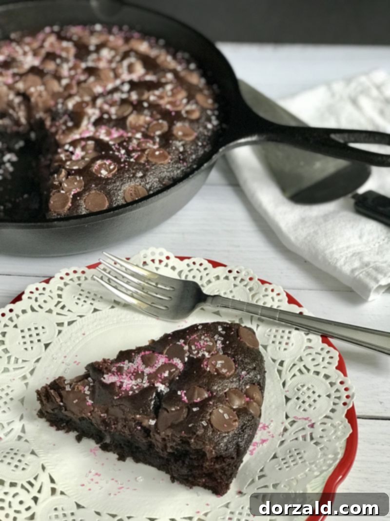 Sun-Kissed Mocha Decadence 5 Vegan Orange Mocha Chocolate Cake ready for serving in a cast iron pan