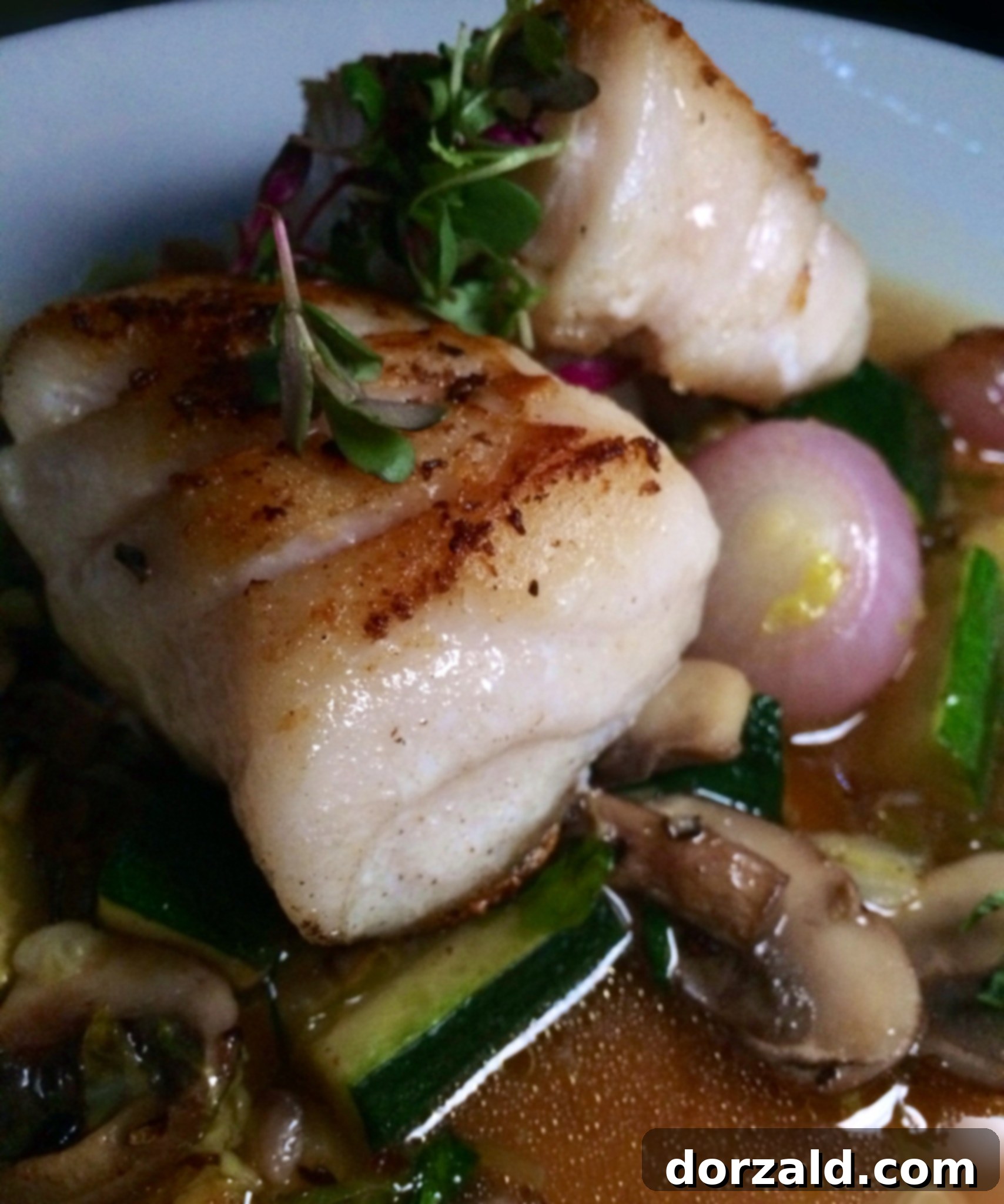 The sophisticated interior of The Woolworth Dallas restaurant, inviting diners into a cozy atmosphere.