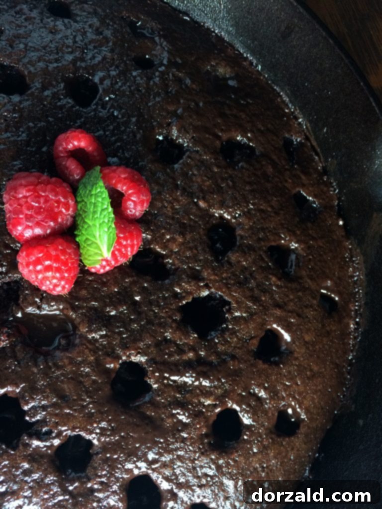 Decadent Vegan Chocolate Amaretto Skillet Cake 4 Vegan chocolate amaretto skillet cake with glaze and holes