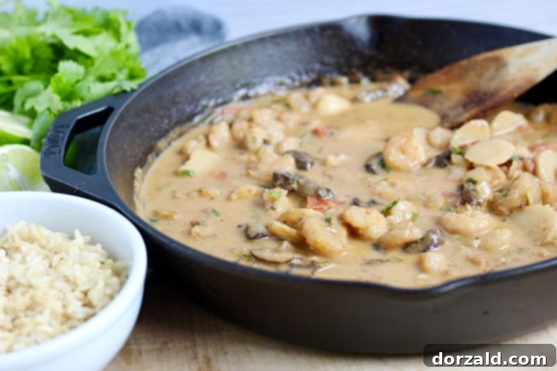 Succulent Creamy Red Chili Shrimp Stir Fry 3 Creamy Red Chili Shrimp Stir Fry served in a bowl with rice and fresh lime