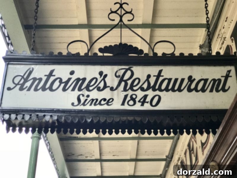 The grand entrance and classic facade of Antoine's Restaurant in New Orleans