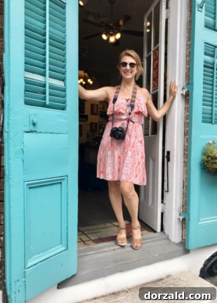 New Orleans Culinary Stroll 22 Food tour guest posing in a scenic New Orleans alley