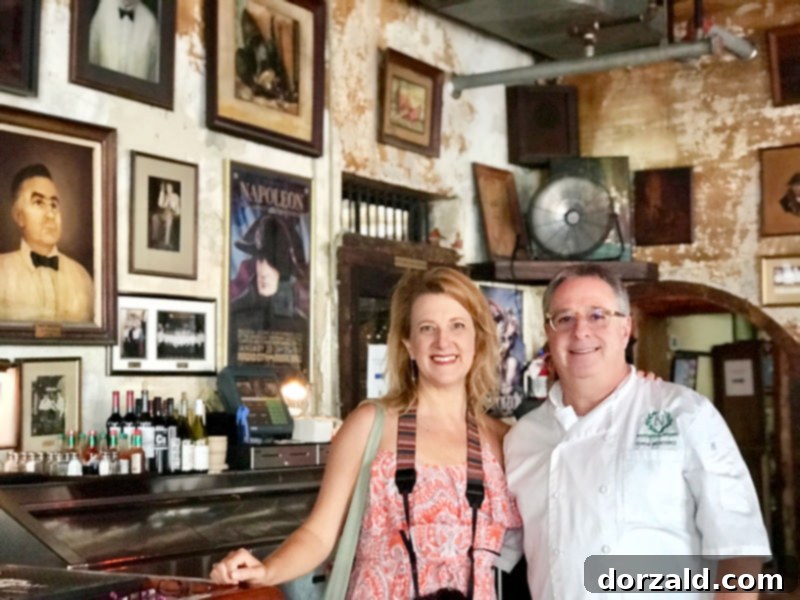 Chef Chris Montero at Napoleon House New Orleans presenting the famous muffaletta sandwich