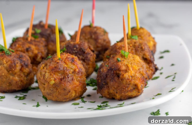 Spicy Turkey Chorizo Meatballs 2 Delicious Turkey Chorizo Meatballs served with oven-roasted cherry tomatoes