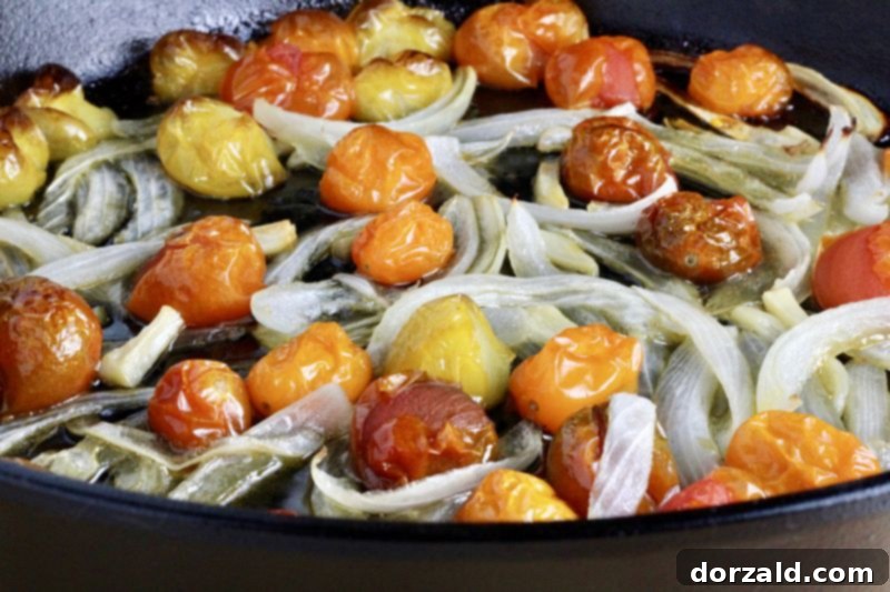 Spicy Turkey Chorizo Meatballs 5 Close-up of blistered oven-roasted cherry tomatoes, a perfect tangy accompaniment for the meatballs.