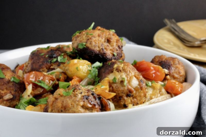 Spicy Turkey Chorizo Meatballs 8 Three turkey chorizo meatballs artfully arranged, ready to be served or enjoyed.