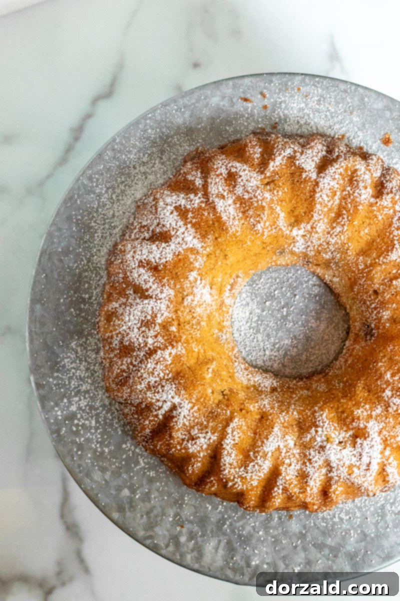 Overhead photo of a golden brown dairy-free bundt cake banana bread from Kitchen Gone Rogue