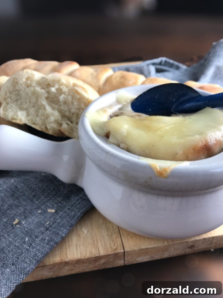 French Onion Soup with golden broth and bread