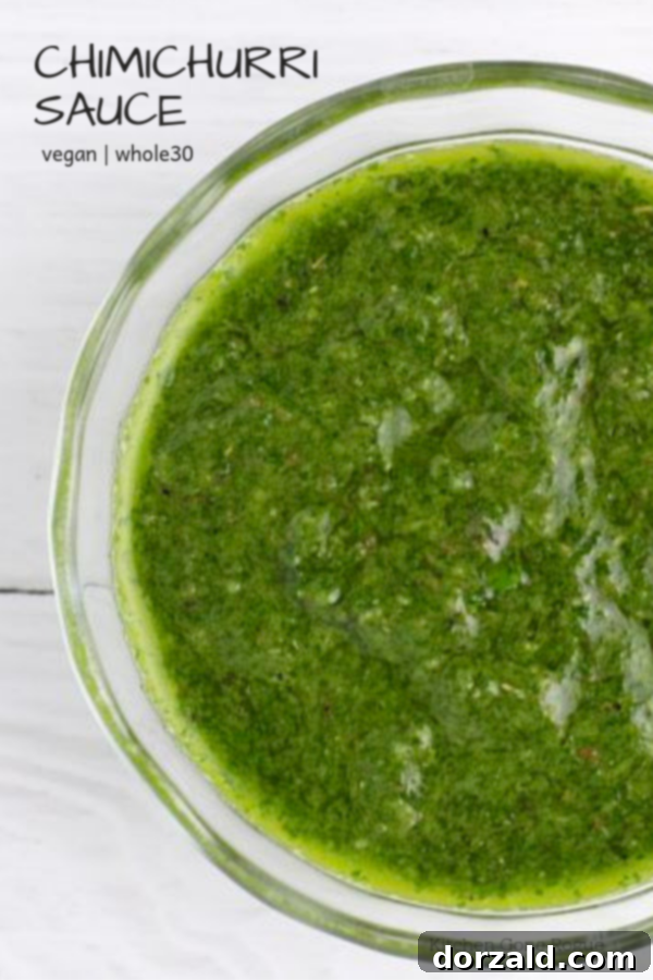 Vegan Whole30 Chimichurri Sauce in a glass jar, ready for serving