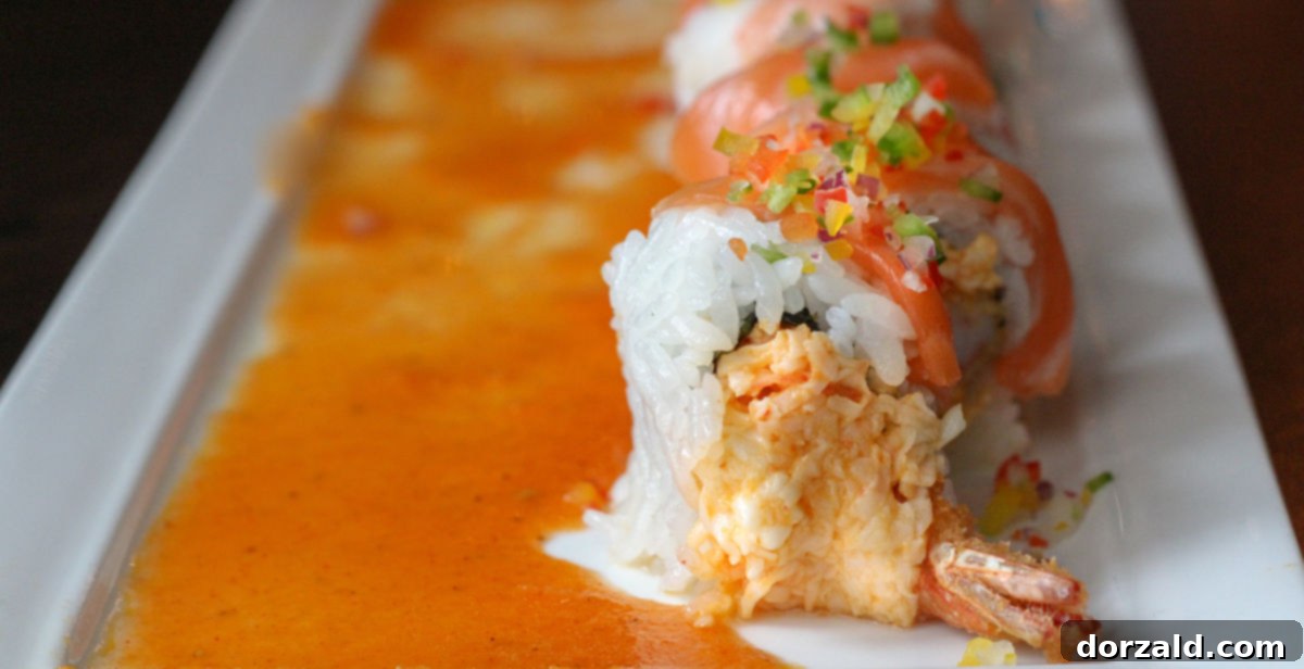 ocean beauty sushi roll on plate with sauce at Edoko restaurant in Richardson, TX - photo by Kelly Kirkendoll