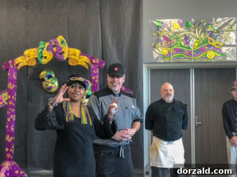 A group of students and instructors proudly posing at The Bistro