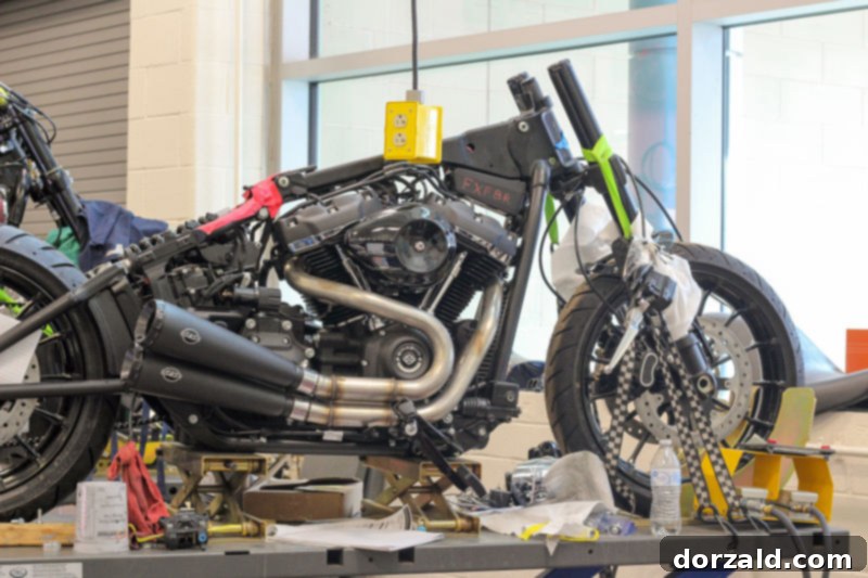 Students working on motorcycles in the automotive technology program