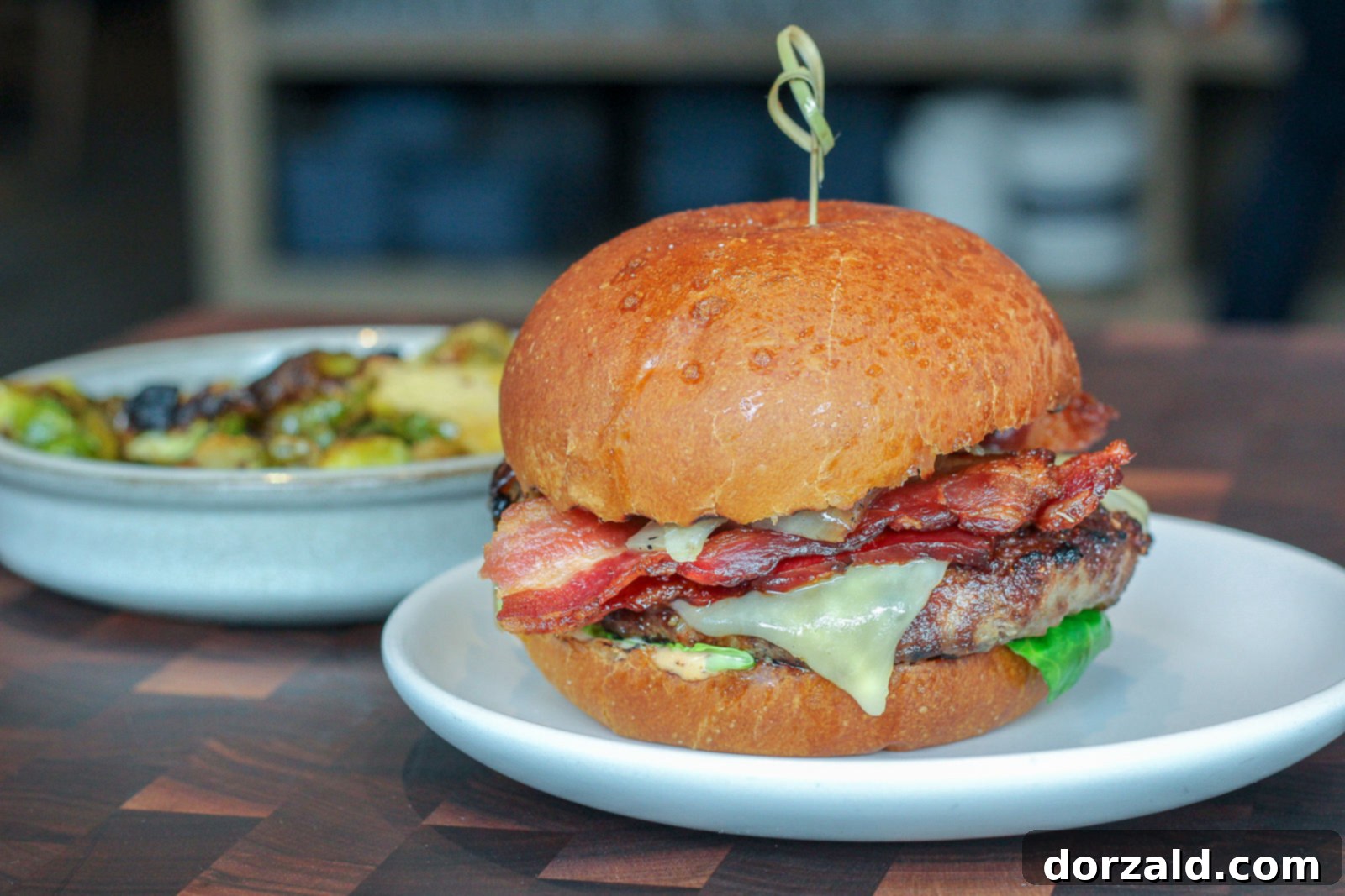 Gourmet Wagyu burger with crispy bacon at The Henry Dallas