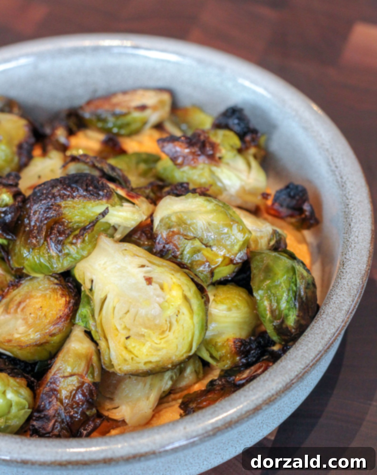 Delicious roasted Brussels sprouts with cashew harissa at The Henry Dallas