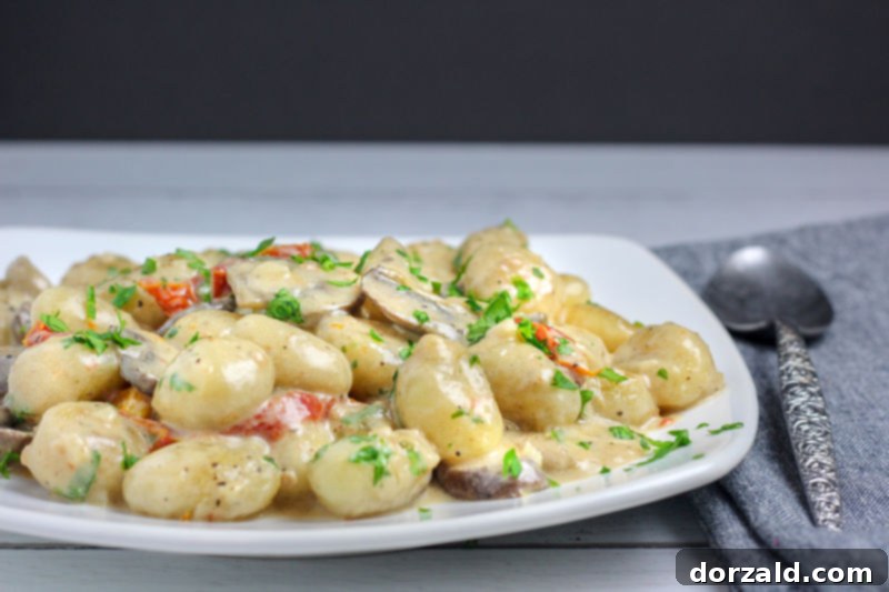 vegan pan fried gnocchi mushroom cream sauce plated