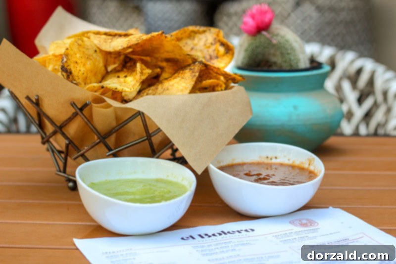 El Bolero Crockett Row: Restaurant Review 4 El Bolero Crockett Row's signature basket of crispy chips and two house-made salsas