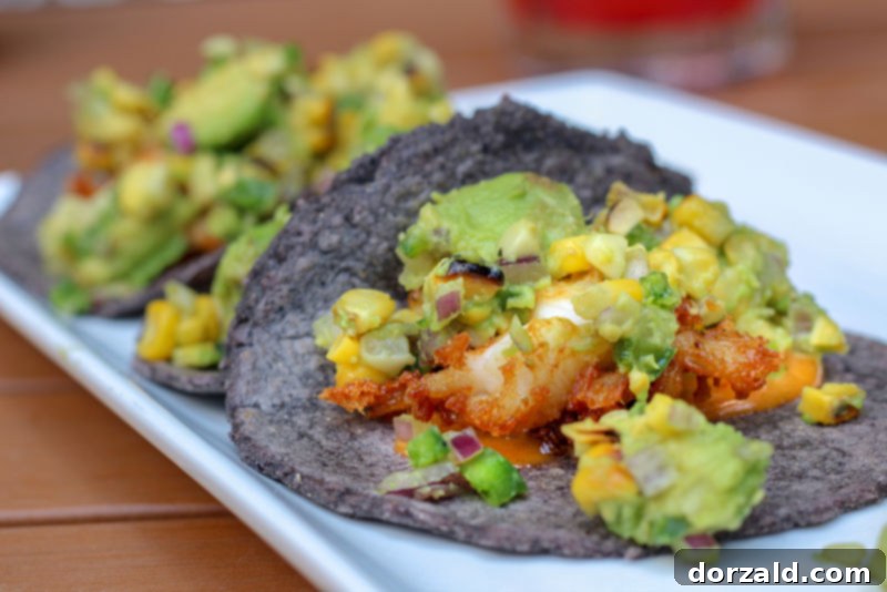 El Bolero Crockett Row: Restaurant Review 8 Three delightful lobster tacos served with a side of cilantro rice at El Bolero