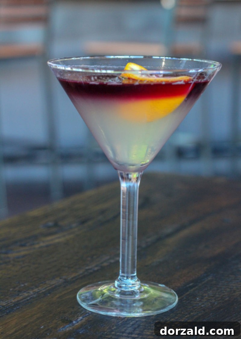 Walk-On's Bistreaux & Bar Arlington Review 6 Bandita signature cocktail, a tequila-based drink with mango liqueur and red wine float