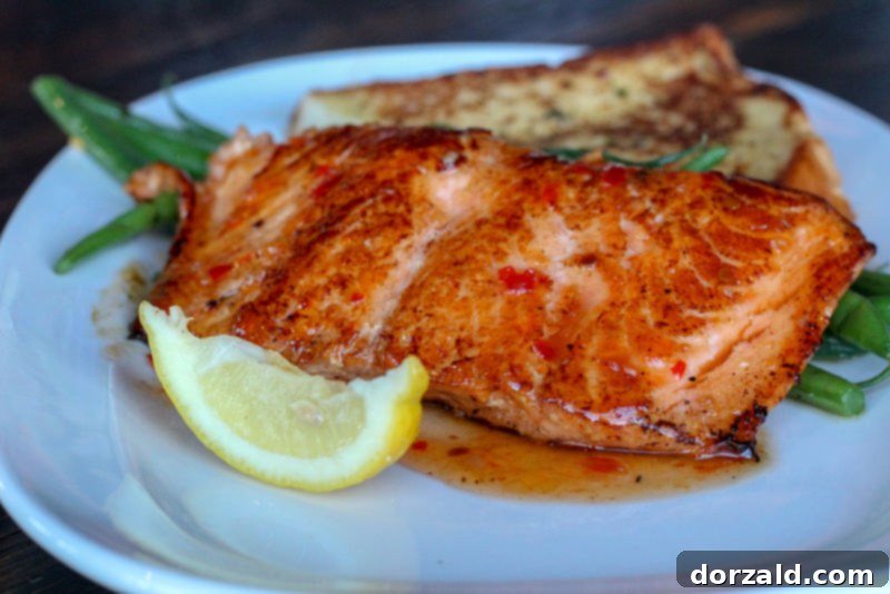 Walk-On's Bistreaux & Bar Arlington Review 8 Sweet Chili Salmon with green beans and garlic bread at Walk-On's, a healthy and flavorful entree