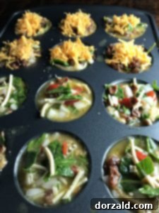 Hearty Grab and Go Egg Veggie Muffins 9 Egg mixture poured into muffin tin with bread bases, ready for baking