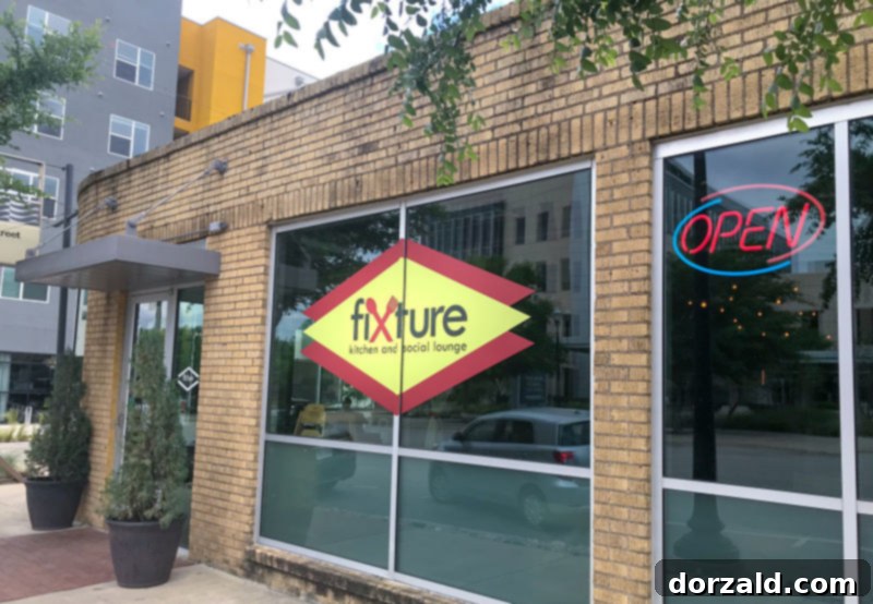 Stylish exterior of Fixture Kitchen and Social Lounge in Fort Worth, highlighting its modern design