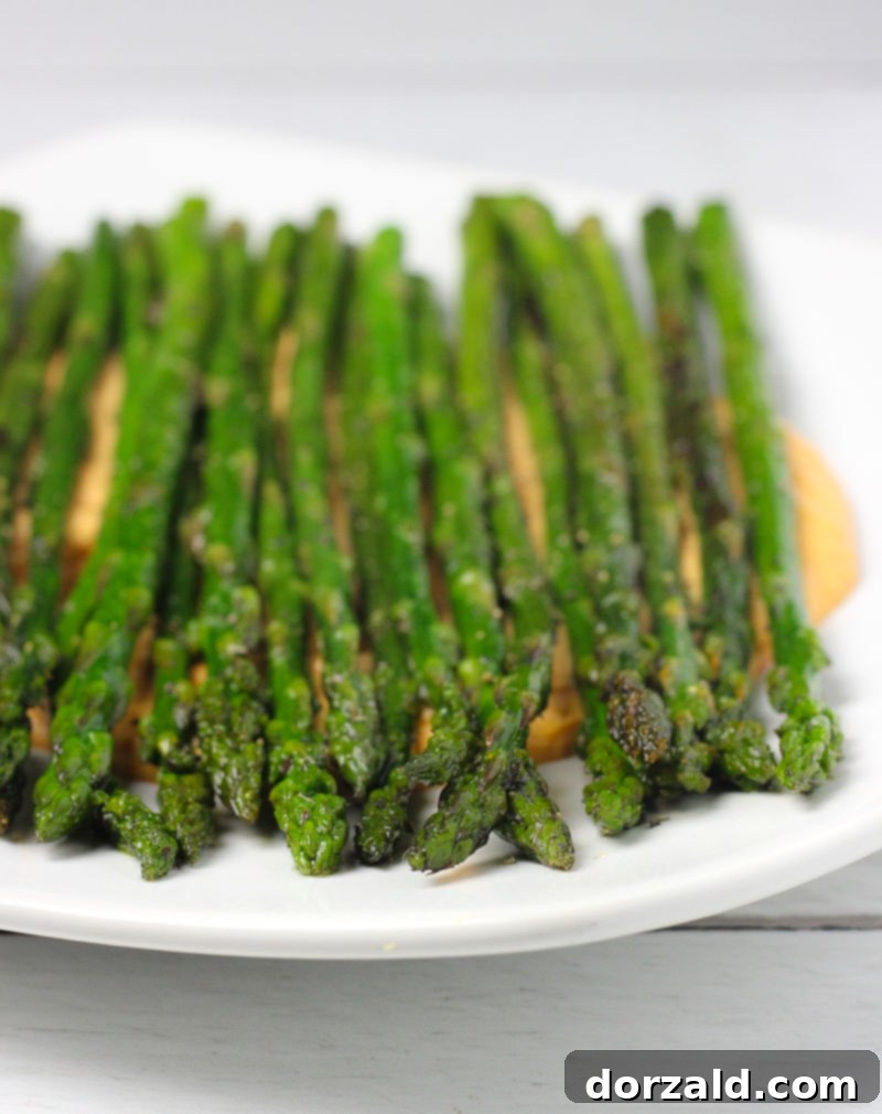Roasted Asparagus with Spicy Harissa Cashew Sauce 5 asparagus cooking in pan, how to cook asparagus