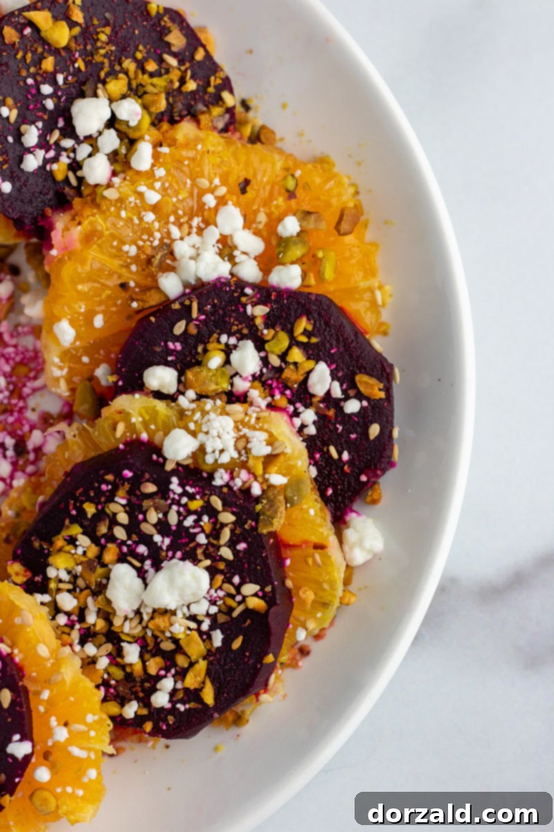 Close-up of Orange Beet Salad showcasing alternating slices