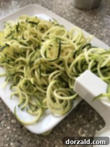 Spiralizing zucchini into delicate noodles