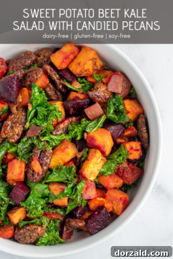 Candied Pecan Kale Salad with Sweet Potato and Beets 11 Sweet Potato Beet Kale Salad with Candied Pecans in a white serving bowl ready to be served