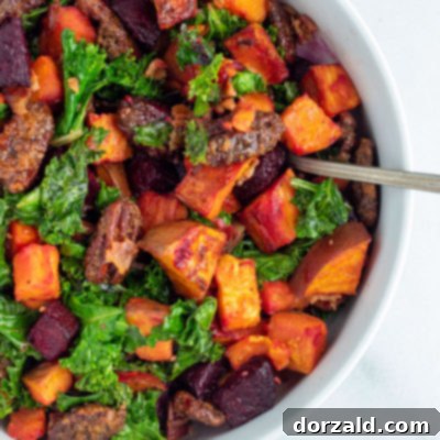 Candied Pecan Kale Salad with Sweet Potato and Beets 12 Sweet Potato Beet Kale Salad in white serving bowl with spoon