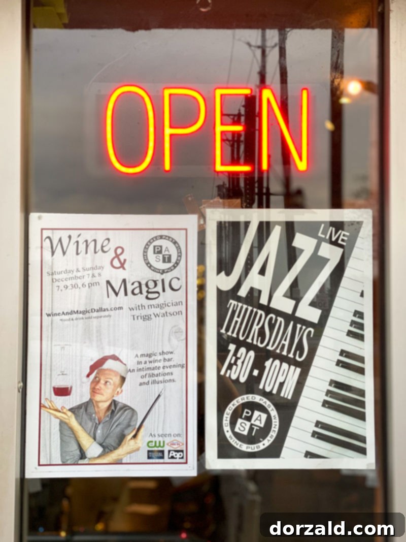 Trigg Watson, a magician, performing a captivating trick, with focused audience members in the background.