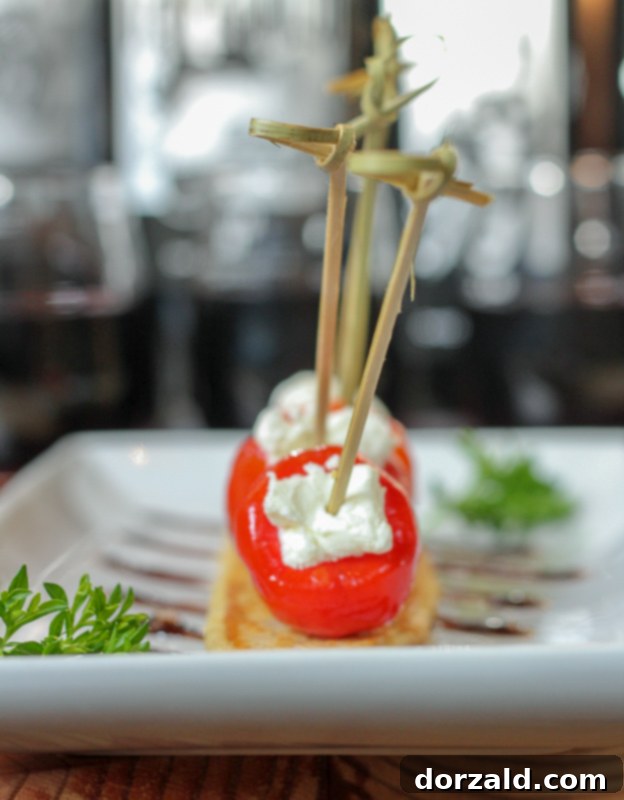 Close-up of Goat Cheese Stuffed Pappadew Skewers, beautifully arranged, served at Checkered Past Winery in Dallas.