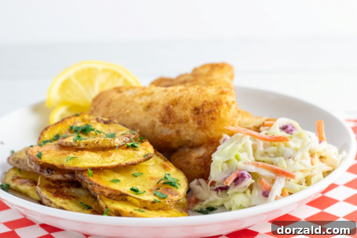 Tangy Homemade Malt Vinegar Potato Chips 2 Freshly made oven-baked malt vinegar potato chips served with fish