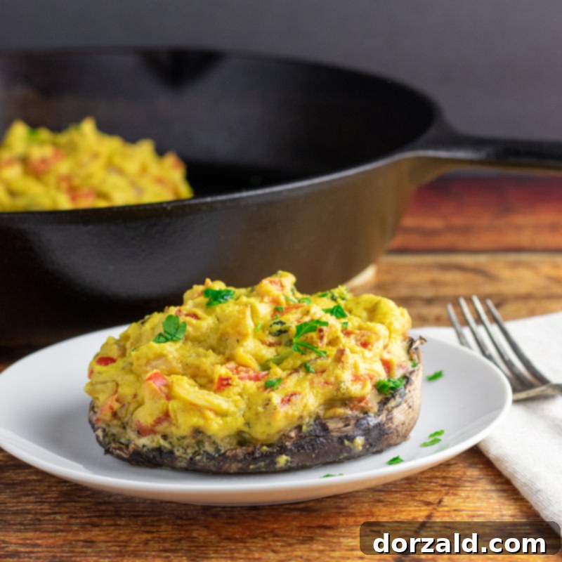 stuffed portobello mushroom on white plate