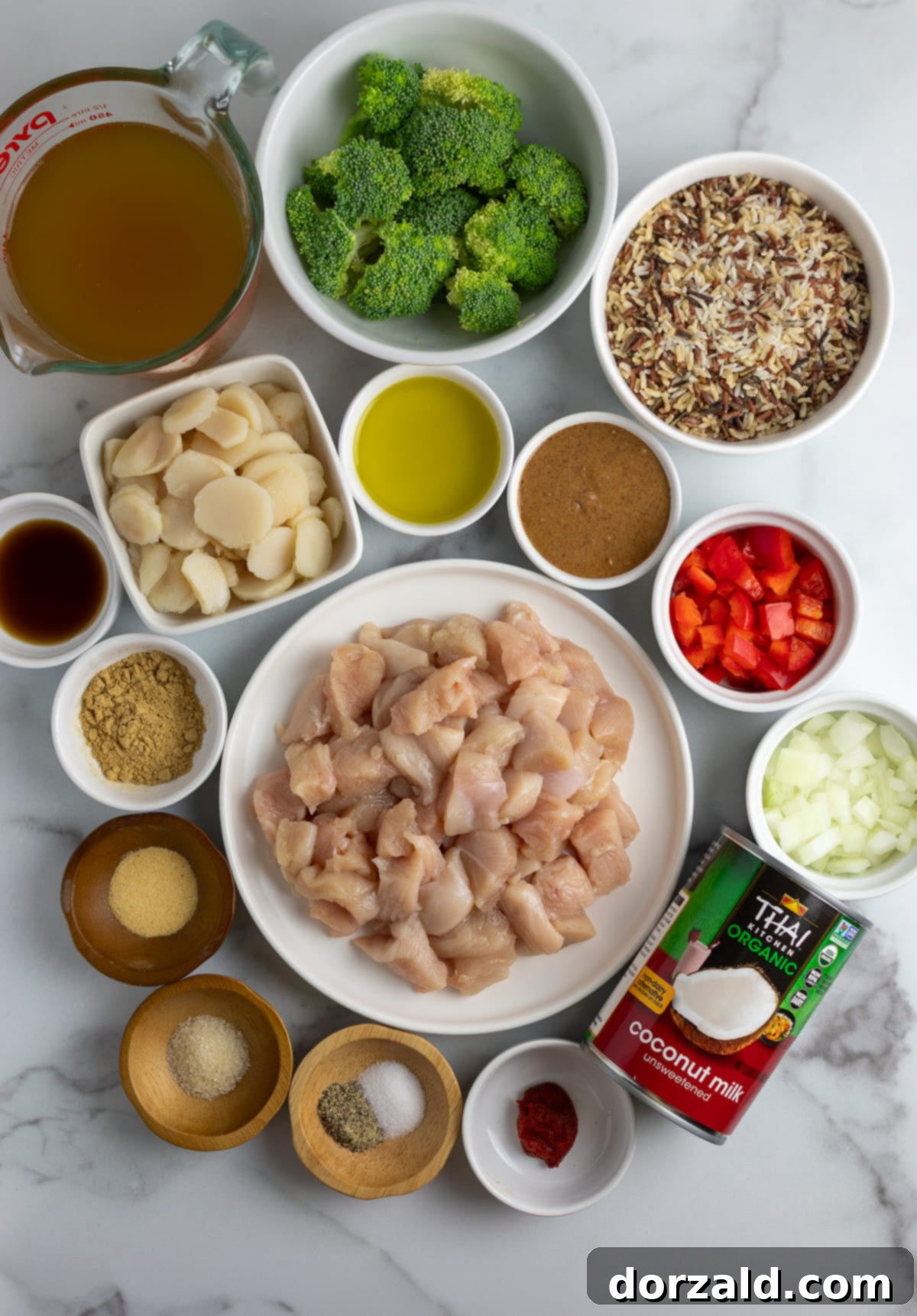 Creamy Almond Butter Coconut Curry Chicken 4 Fresh ingredients laid out for Almond Butter Coconut Curry Chicken preparation.