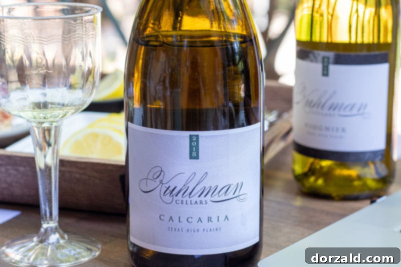 Kuhlman Cellars Calcaria white wine bottle and glass