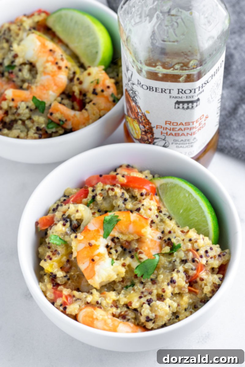 Zesty One-Pot Shrimp Quinoa 7 Spicy pineapple habanero shrimp cooking in the pan