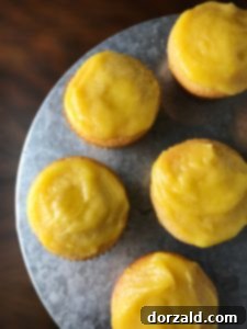 lemon curd filled lemon cupcakes ready to eat