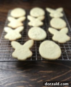 Freshly baked lemon shortbread sugar cookies cooling on a wire rack