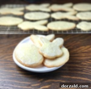 Iced lemon shortbread sugar cookies with colorful sprinkles