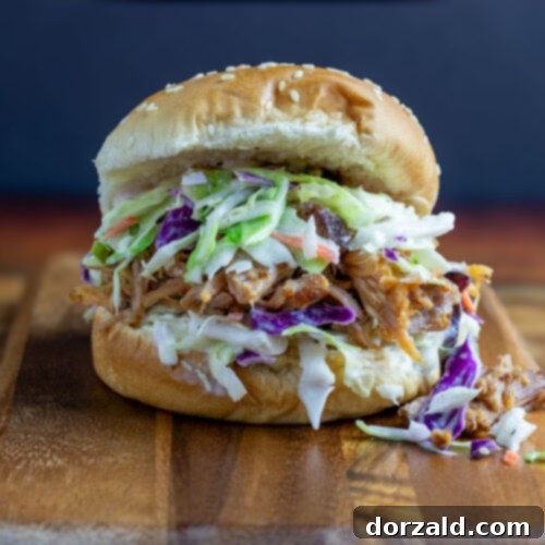 Smoked Pulled Pork and Creamy Slaw Sandwich 8 A delicious and satisfying Pulled Pork Coleslaw Sandwich, ready to be enjoyed.