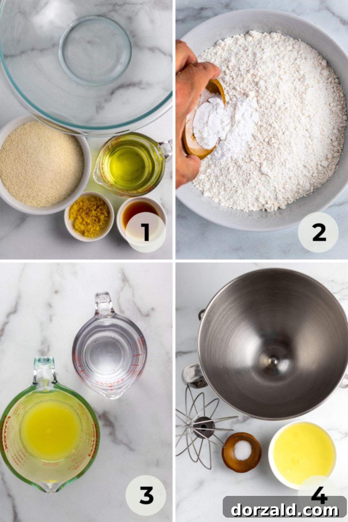 Whipped egg whites in a stand mixer bowl.