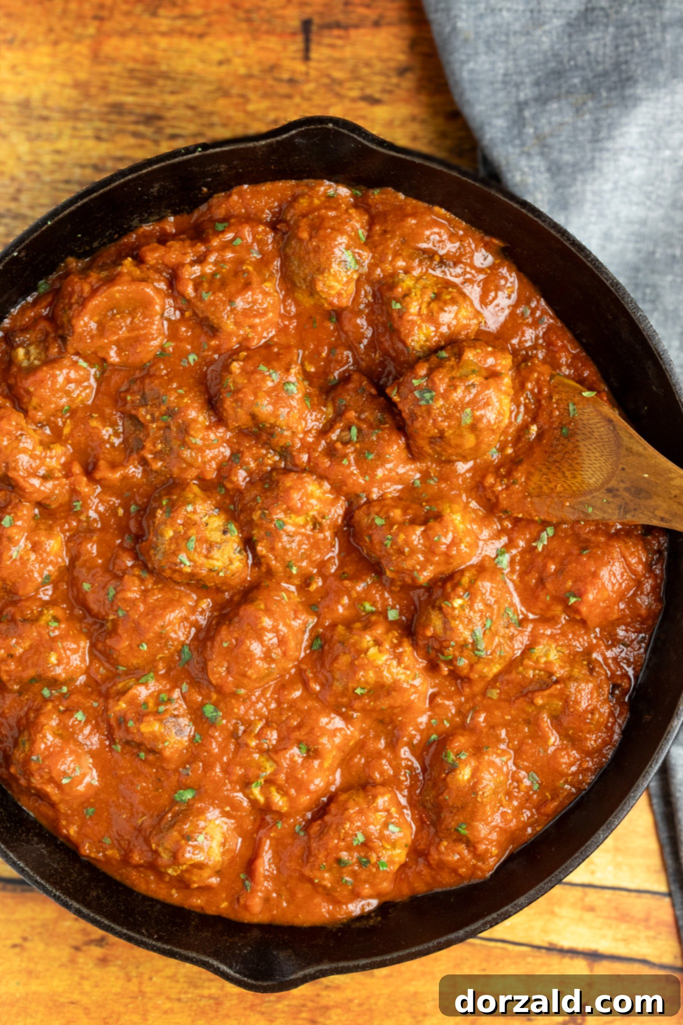 Authentic Italian Gluten-Free Dairy-Free Meatballs 3 Raw gluten and dairy free meatballs shaped and ready for cooking.