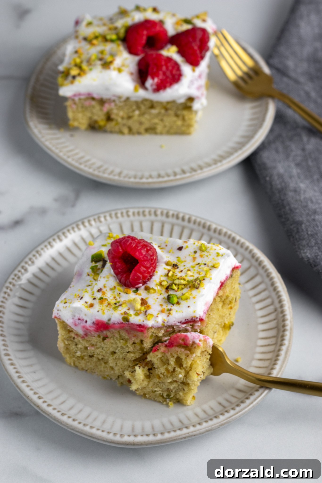 Simple Pistachio Raspberry Cake 3 Close-up of the pistachio raspberry cake layers.